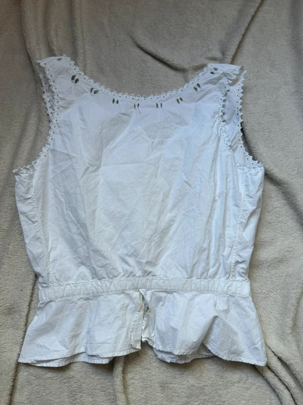 Cache corset blanc boutonné et détails fleuris ajourés – taille XS