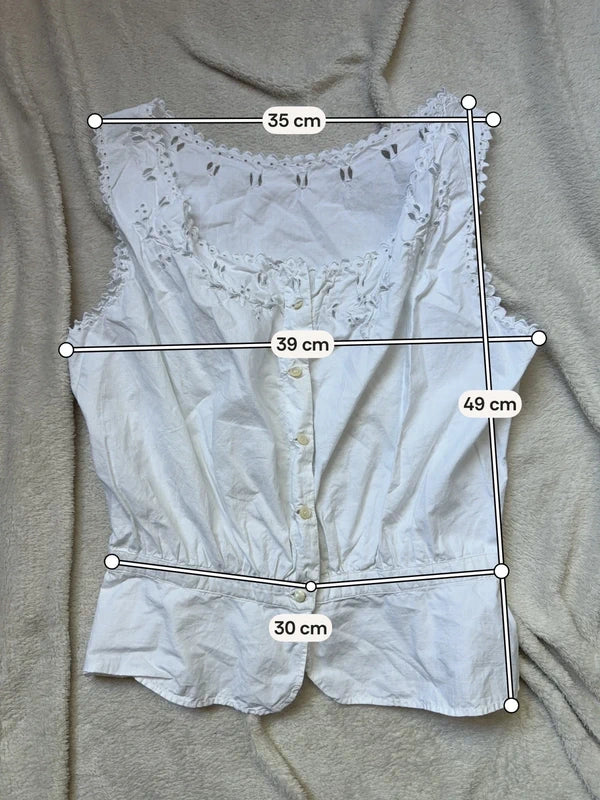 Cache corset blanc boutonné et détails fleuris ajourés – taille XS