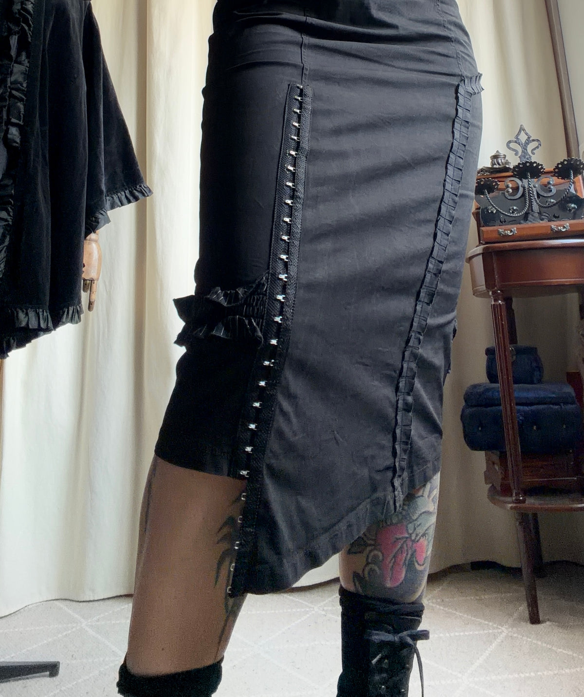 Asymmetric black midi dress with hook-and-eye and ruffle details, avant-garde goth style – size S