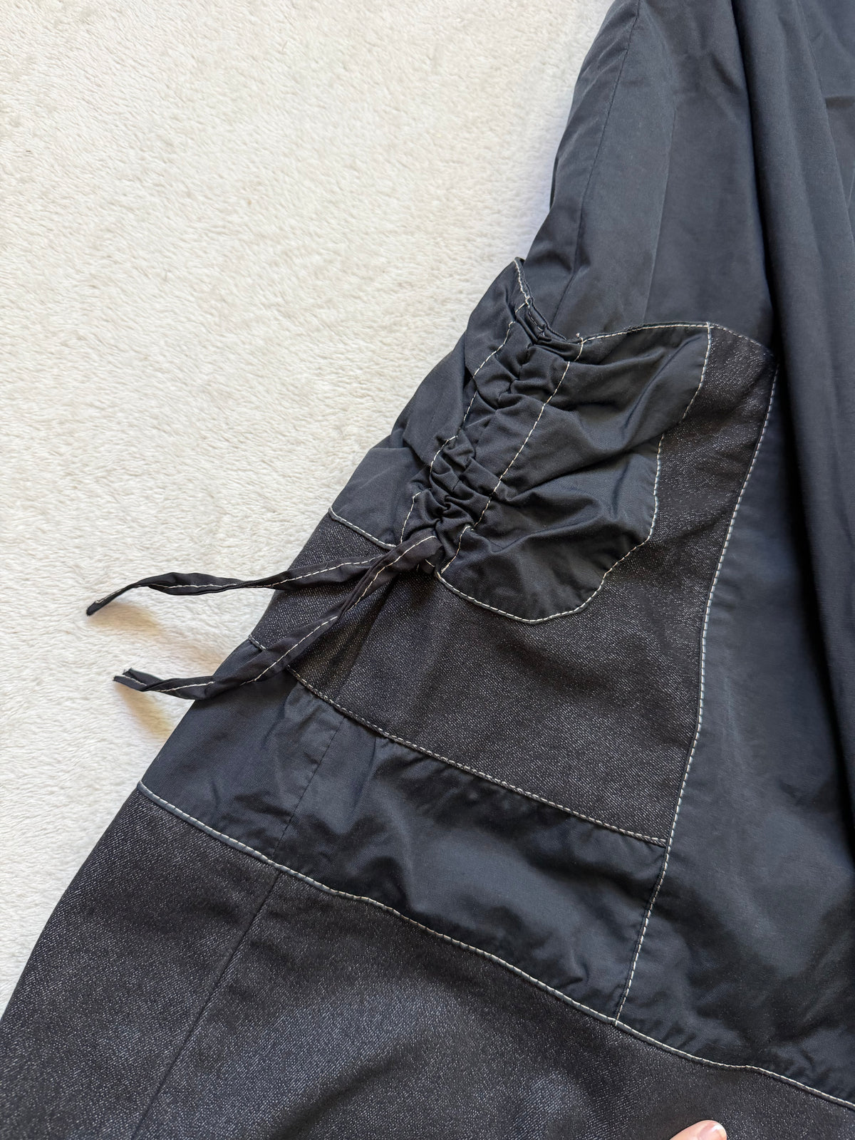 Jupe midi noire asymétrique surpiqûres contrastantes style avant garde goth – taille M