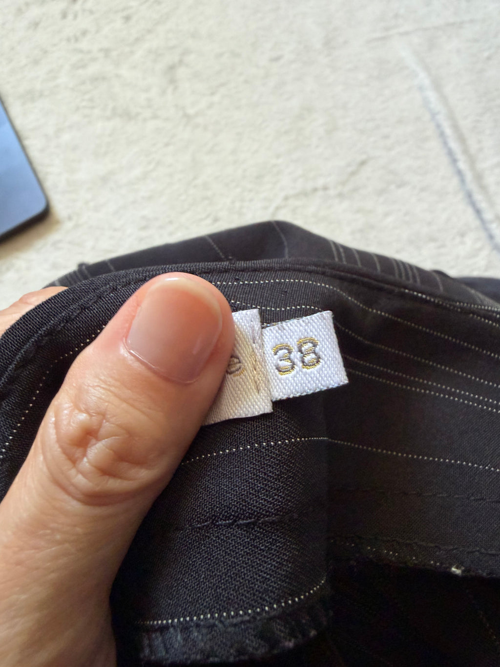 Pantalon noir taille haute à fines rayures jambes évasées - Taille M