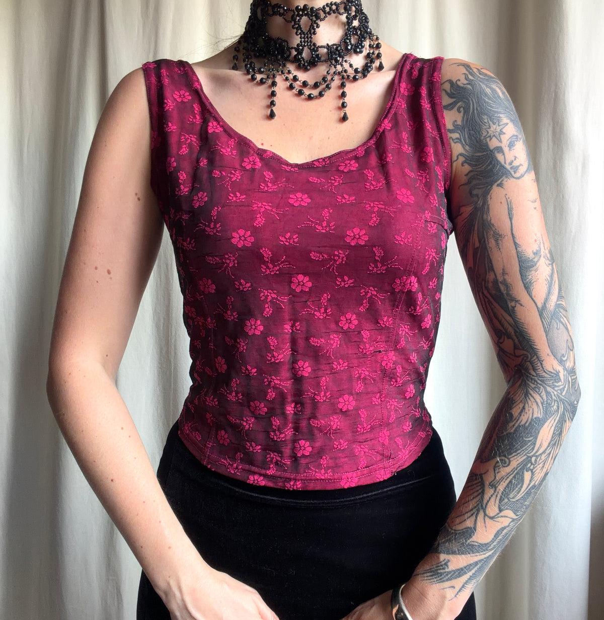Burgundy corset top with pink floral patterns – size L