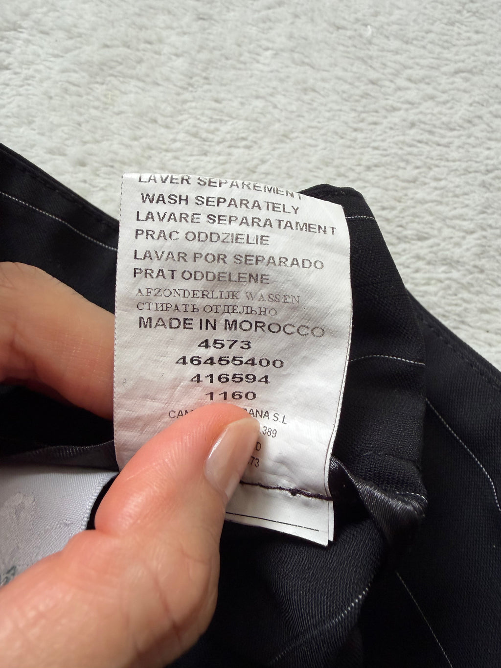 Pantalon noir à fines rayures blanches coupe flare – taille M