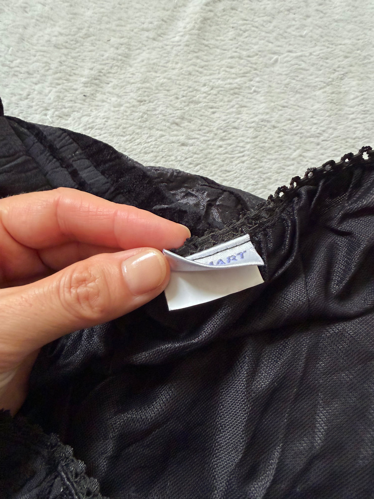 Jupe midi noire évasée à empiècements en biais – taille L/XL