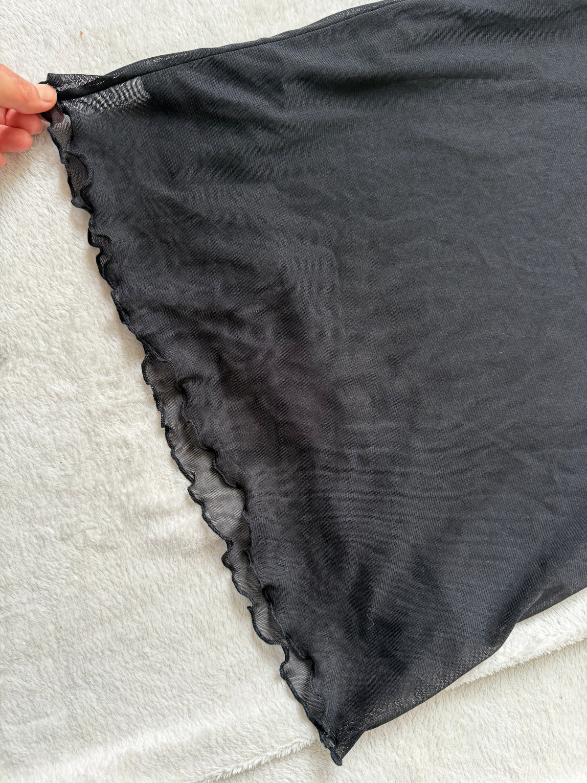 Jupe midi noire à voile transparent et bord ondulé  – taille XS/S