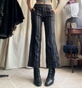 Black and gray pinstriped flare trousers, corporate goth office siren style - size M